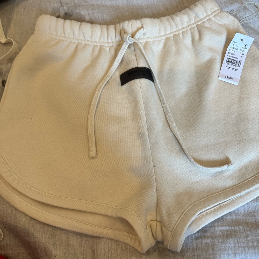 NWT essentials shorts in eggshell size small